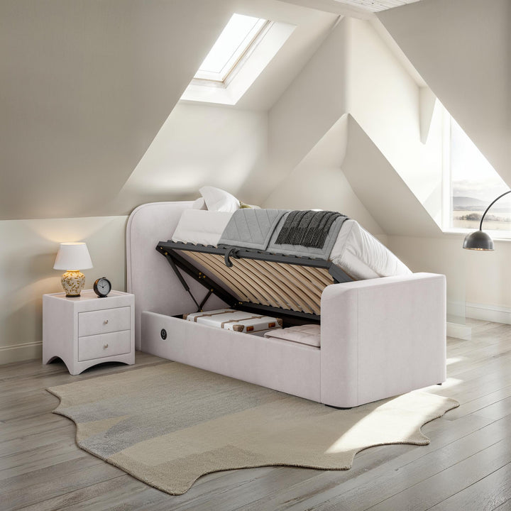 Arla Ottoman Single Storage TV Bed with USB Charging in Luxury Natural Cream Fabric.