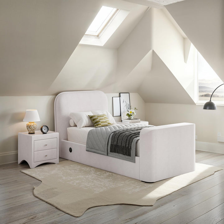 Arla Ottoman Single Storage TV Bed with USB Charging in Luxury Natural Cream Fabric.