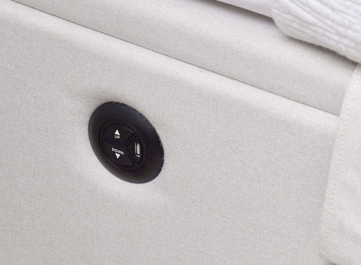 Essence Ottoman Storage TV Bed with USB Charging in Natural Cream Fabric.