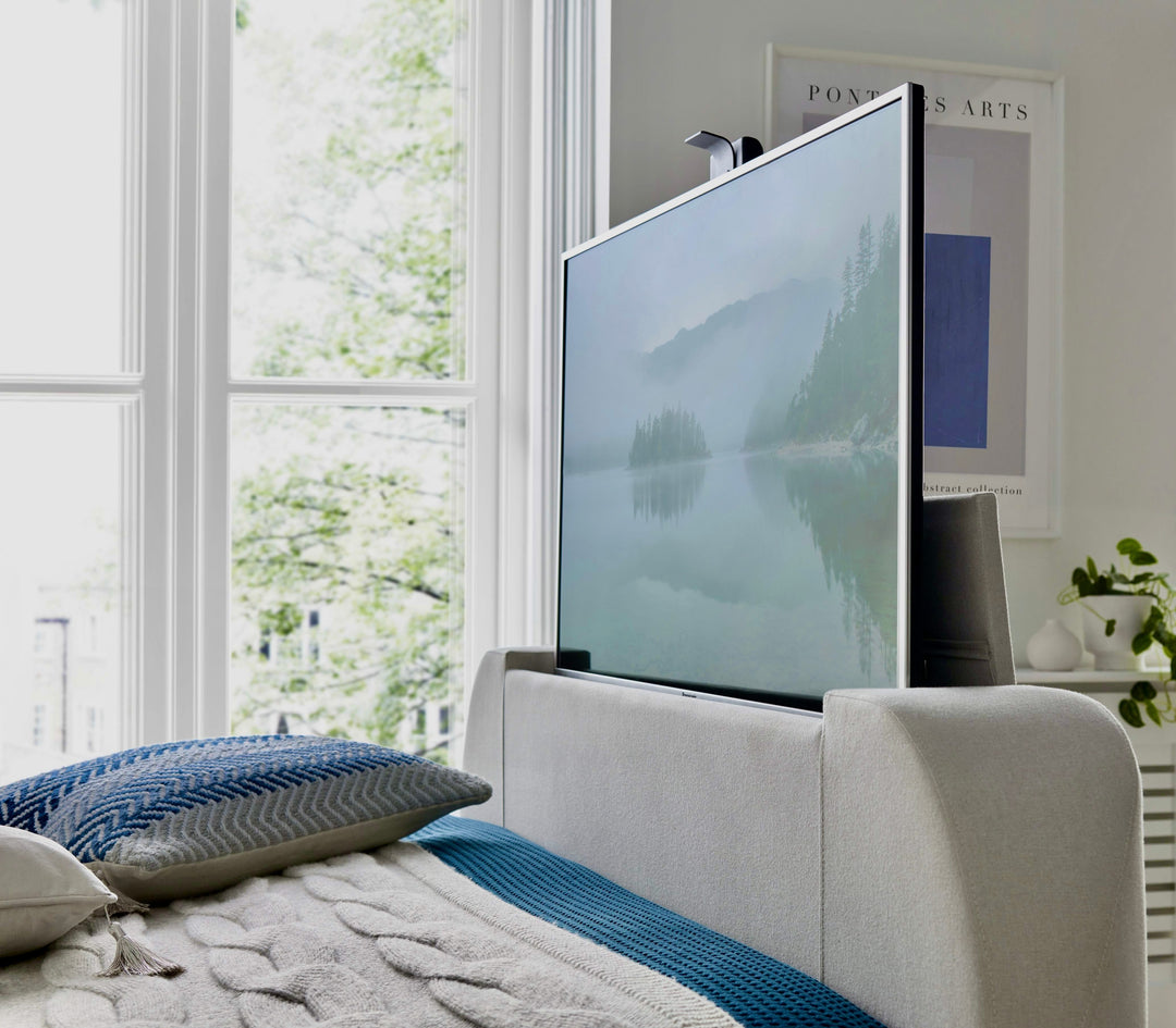 Essence Ottoman Storage TV Bed with USB Charging in Natural Cream Fabric.